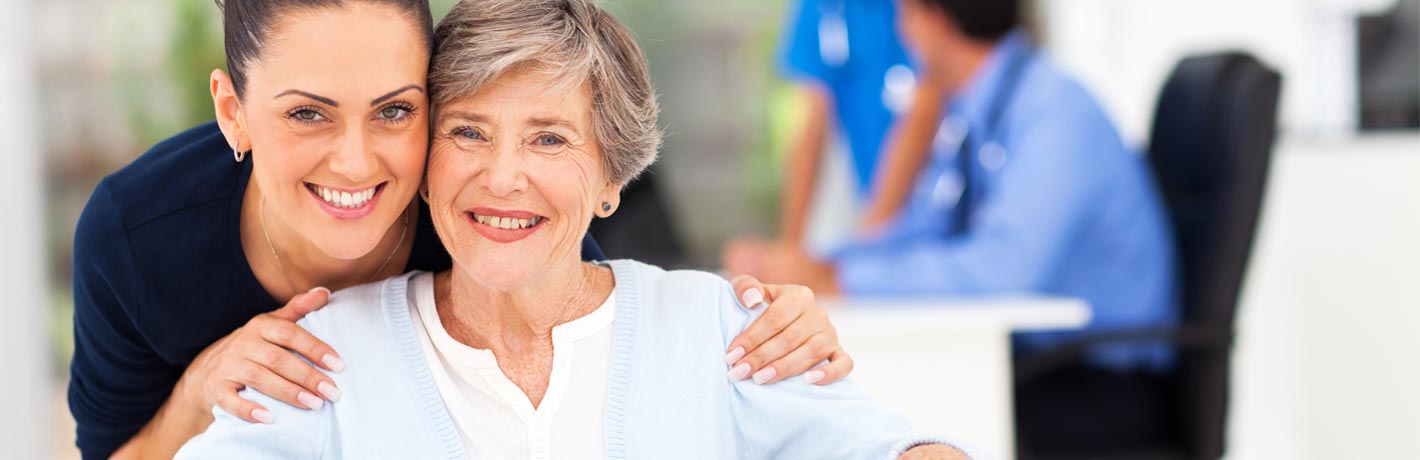 Image of a nurse and a female patient.