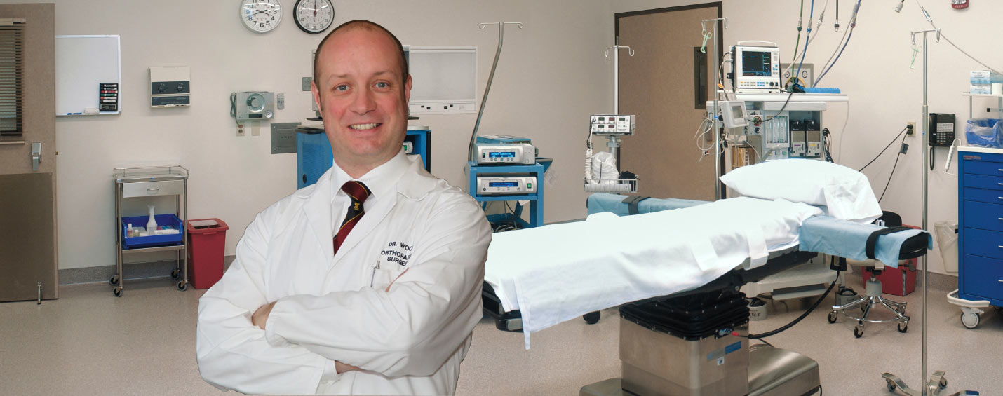 Image of Dr. Gavin Wood in an operating room.