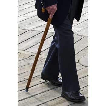 Image of man walking with a cane.