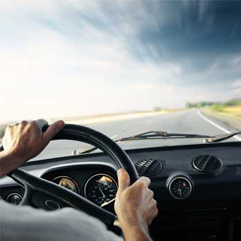 Image of patient driving a car.